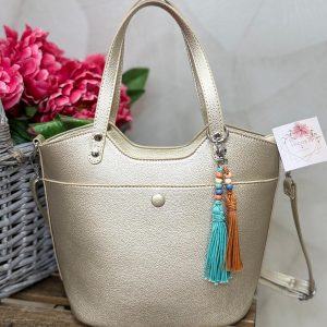 Bolso shopper dorado con borlas decorativas